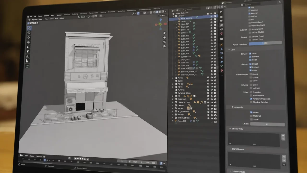 Monitor de MacBook Pro mostrando la interface de Blender.